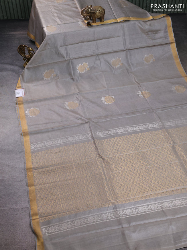 Banana silk saree grey with silver & gold zari woven floral buttas and zari woven border