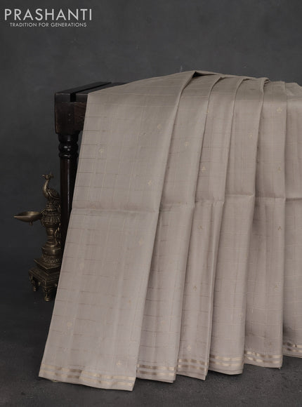 Pure soft silk saree beige and yellow with allover zari checks & buttas and simple zari border