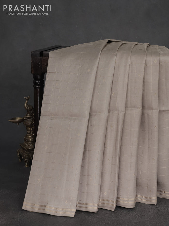 Pure soft silk saree beige and yellow with allover zari checks & buttas and simple zari border