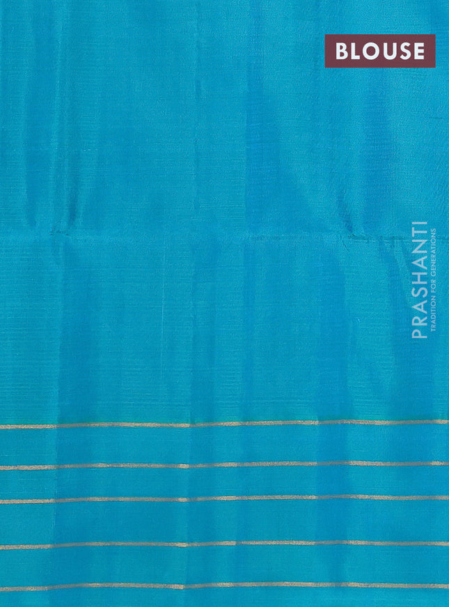 Pure soft silk saree dual shade of pinkish orange and teal blue with allover zari weaves and zari woven simple border