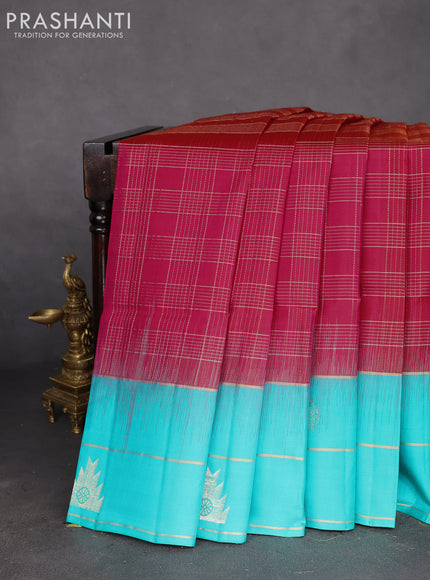 Pure soft silk saree dual shade of pinkish orange and teal blue with allover zari checked pattern and zari woven simple border