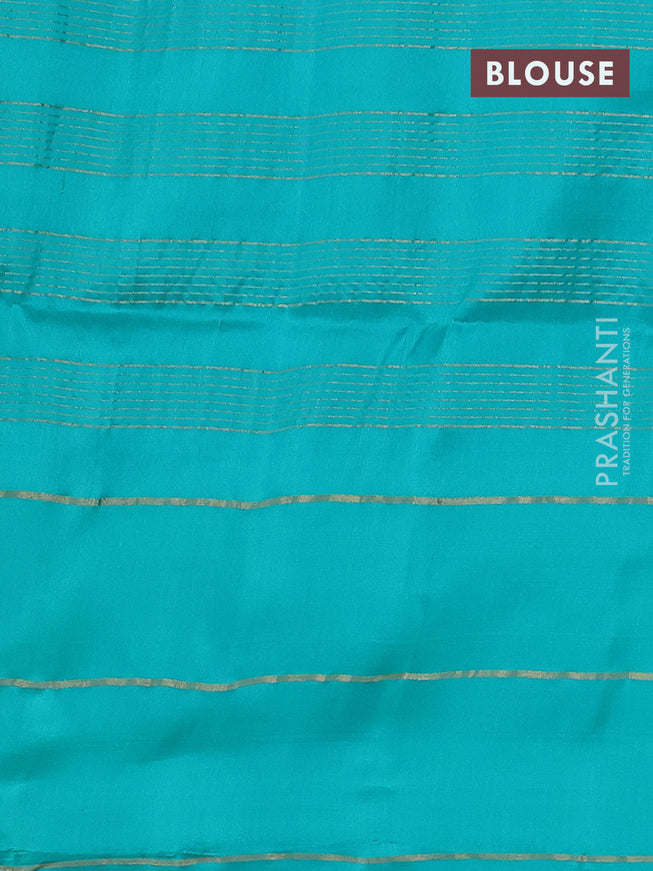 Pure soft silk saree dual shade of pinkish orange and teal blue with allover zari checked pattern and zari woven simple border
