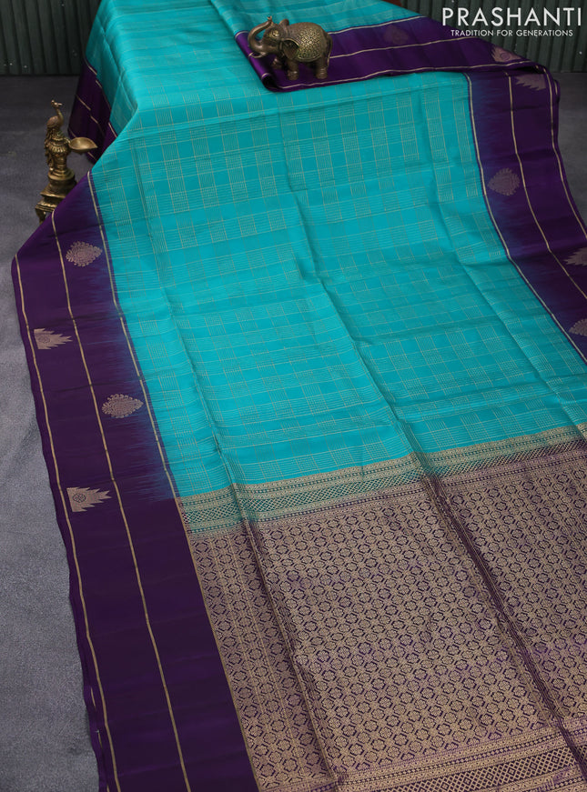 Pure soft silk saree teal green and violet with allover zari checked pattern and zari woven simple border