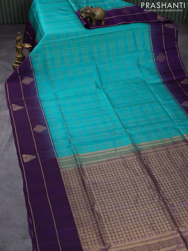 Pure soft silk saree teal green and violet with allover zari checked pattern and zari woven simple border
