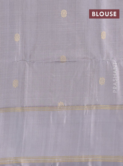 Pure soft silk saree green and grey with zari woven buttas and rettapet zari woven border