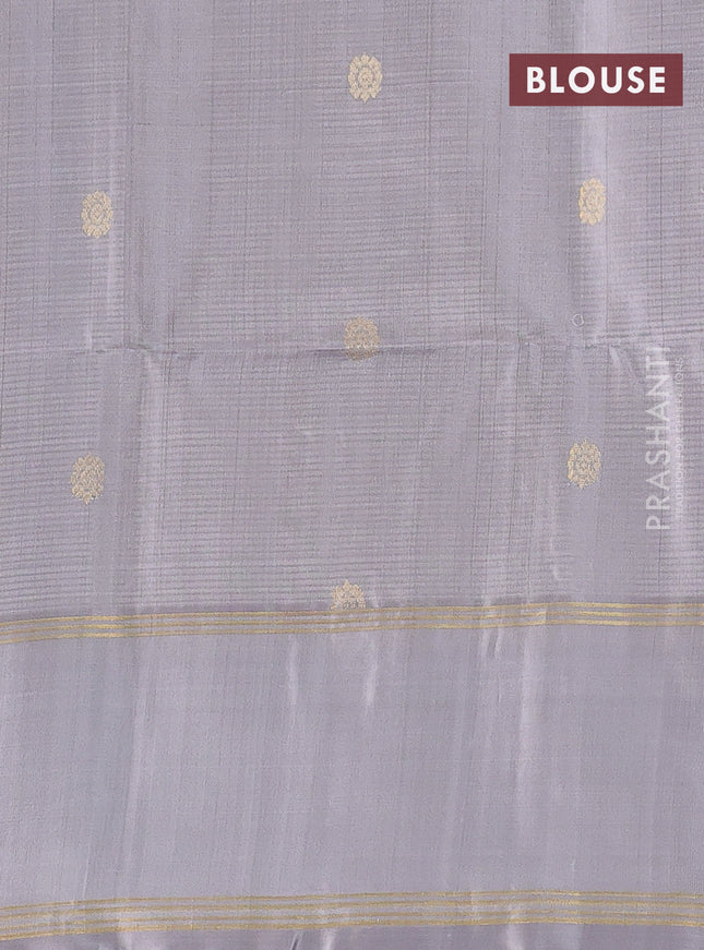 Pure soft silk saree green and grey with zari woven buttas and rettapet zari woven border