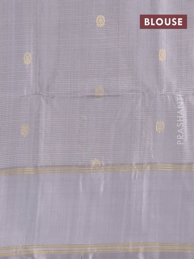 Pure soft silk saree green and grey with zari woven buttas and rettapet zari woven border