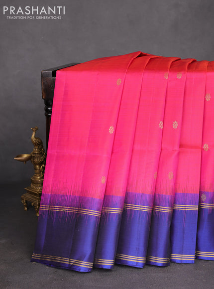 Pure soft silk saree dual shade of pinkish orange and navy blue with zari woven buttas and rettapet zari woven border