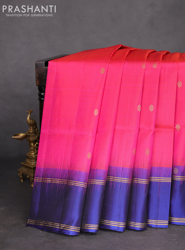 Pure soft silk saree dual shade of pinkish orange and navy blue with zari woven buttas and rettapet zari woven border