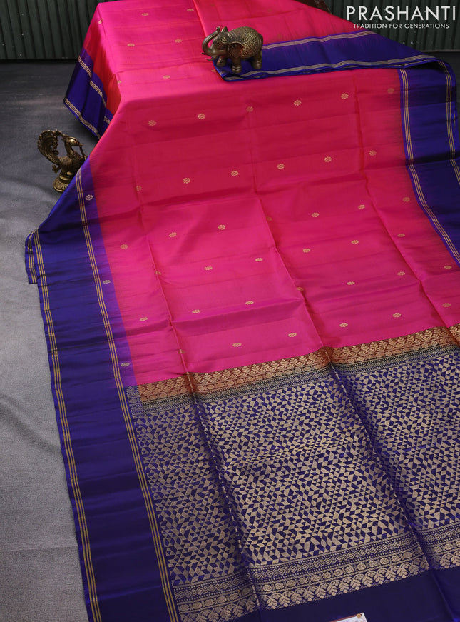 Pure soft silk saree dual shade of pinkish orange and navy blue with zari woven buttas and rettapet zari woven border