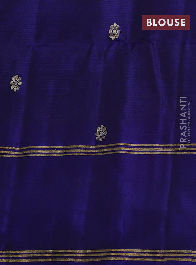 Pure soft silk saree dual shade of pinkish orange and navy blue with zari woven buttas and rettapet zari woven border