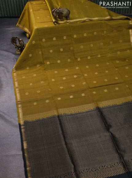 Pure soft silk saree mustard green and black with zari woven buttas and small zari woven border