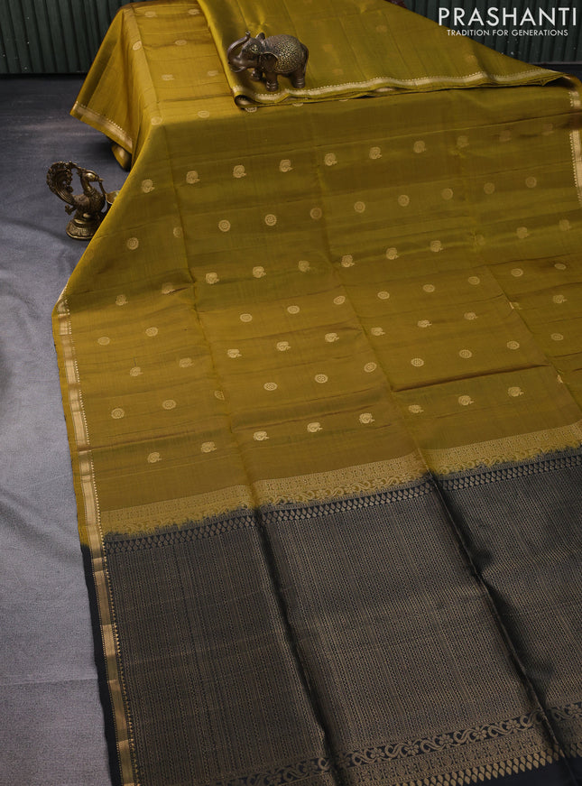 Pure soft silk saree mustard green and black with zari woven buttas and small zari woven border