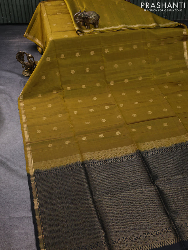 Pure soft silk saree mustard green and black with zari woven buttas and small zari woven border