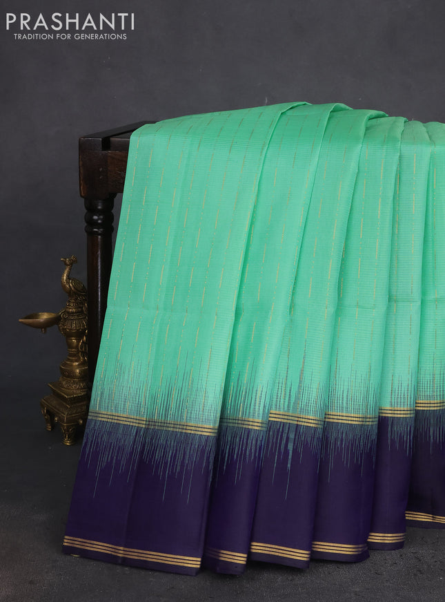 Pure soft silk saree pastel green and navy blue with zari woven buttas and zari woven border