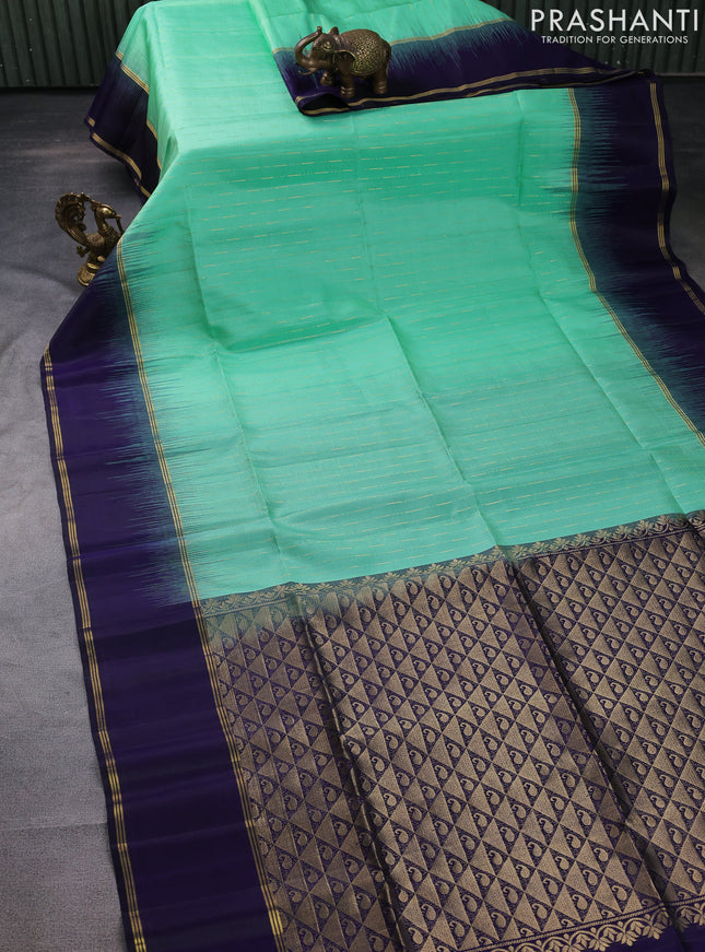 Pure soft silk saree pastel green and navy blue with zari woven buttas and zari woven border