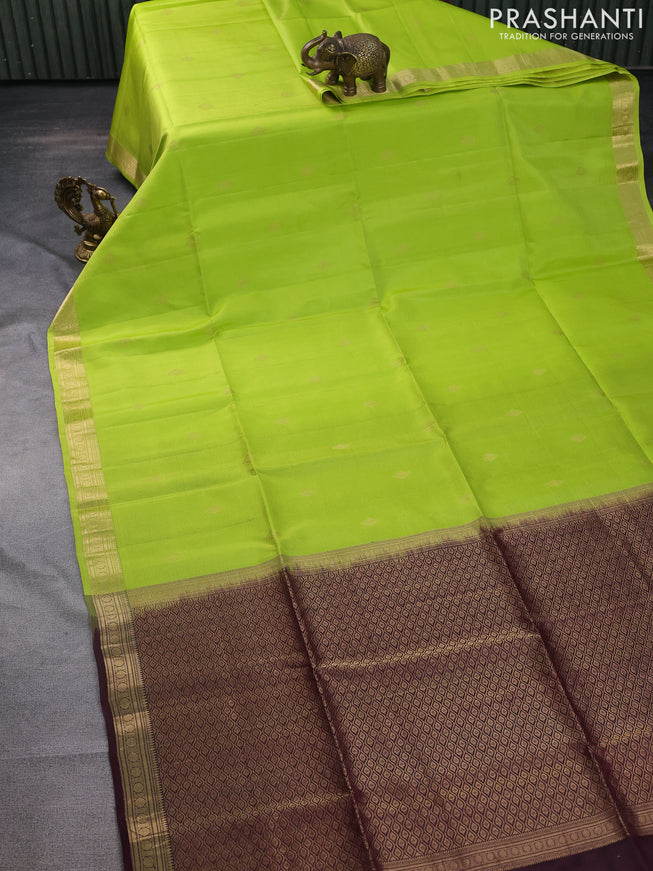 Pure soft silk saree fluorescent green and wine shade with zari woven buttas and zari woven border