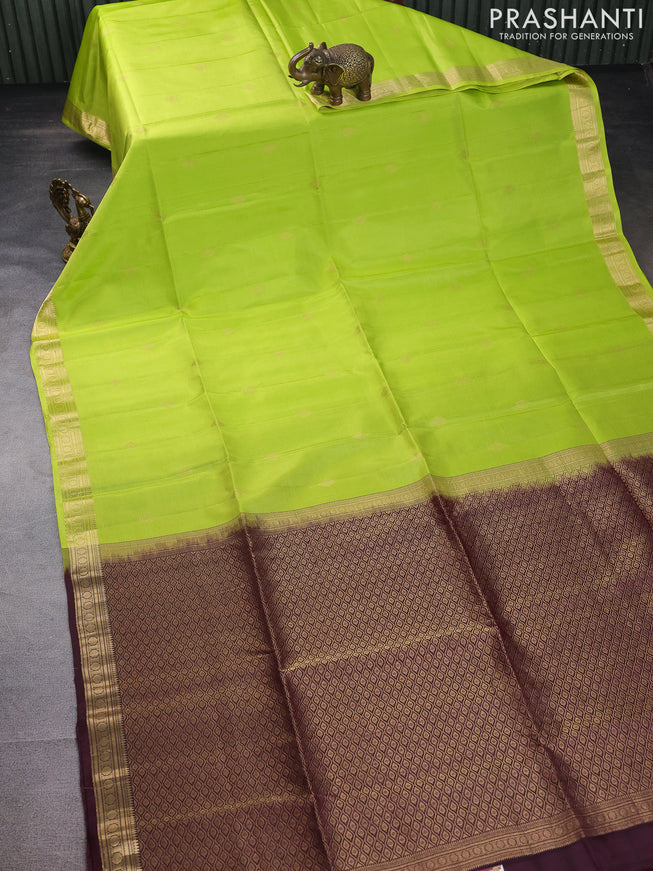 Pure soft silk saree fluorescent green and wine shade with zari woven buttas and zari woven border