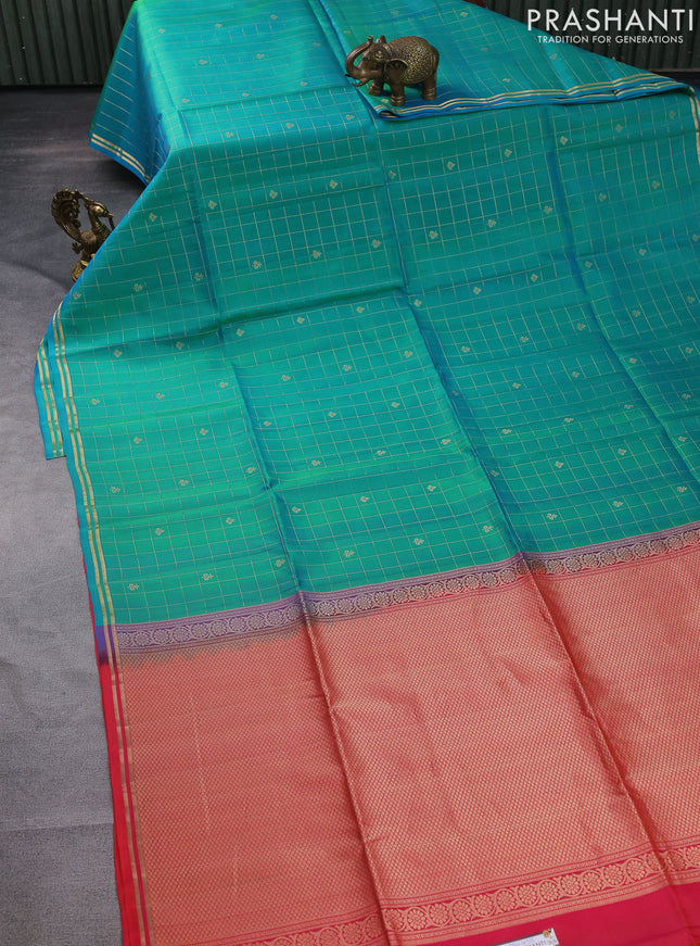 Pure soft silk saree dual shade of teal green and dual shade of pinkish orange with allover small zari checks & buttas and simple zari border