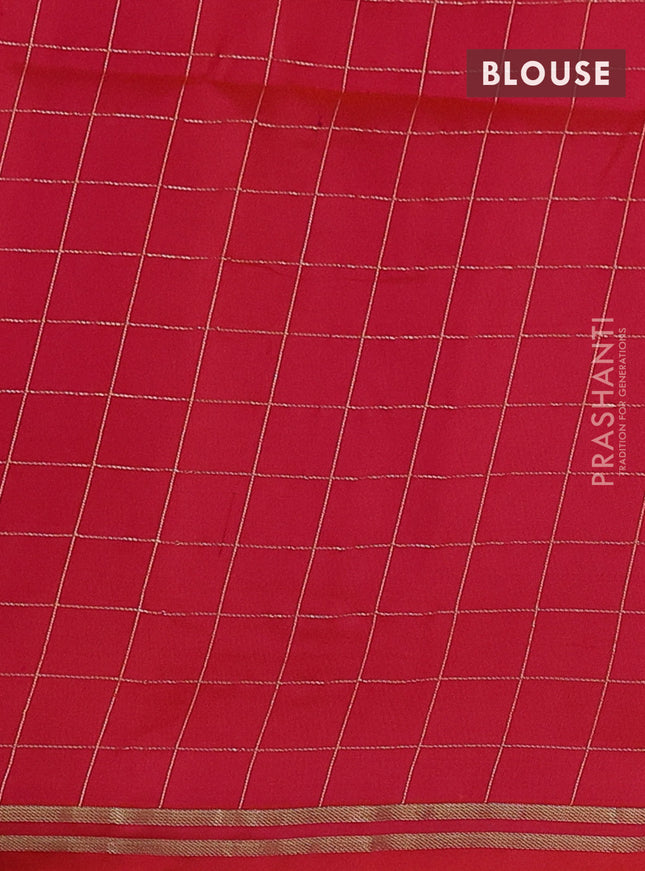 Pure soft silk saree dual shade of teal green and dual shade of pinkish orange with allover small zari checks & buttas and simple zari border