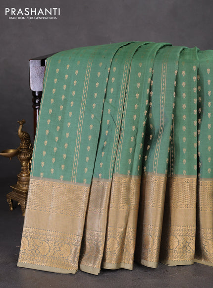 Pure kanchipuram silk saree pastel green and beige with allover zari weaves & buttas and long rich zari woven border