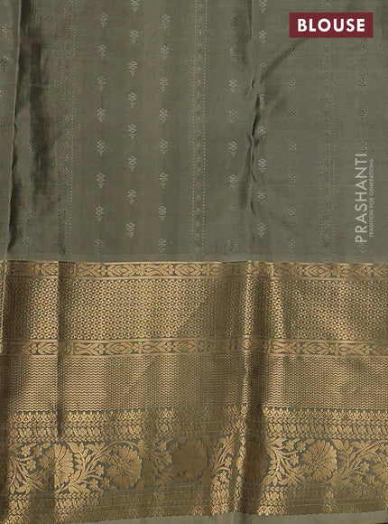 Pure kanchipuram silk saree pastel green and beige with allover zari weaves & buttas and long rich zari woven border