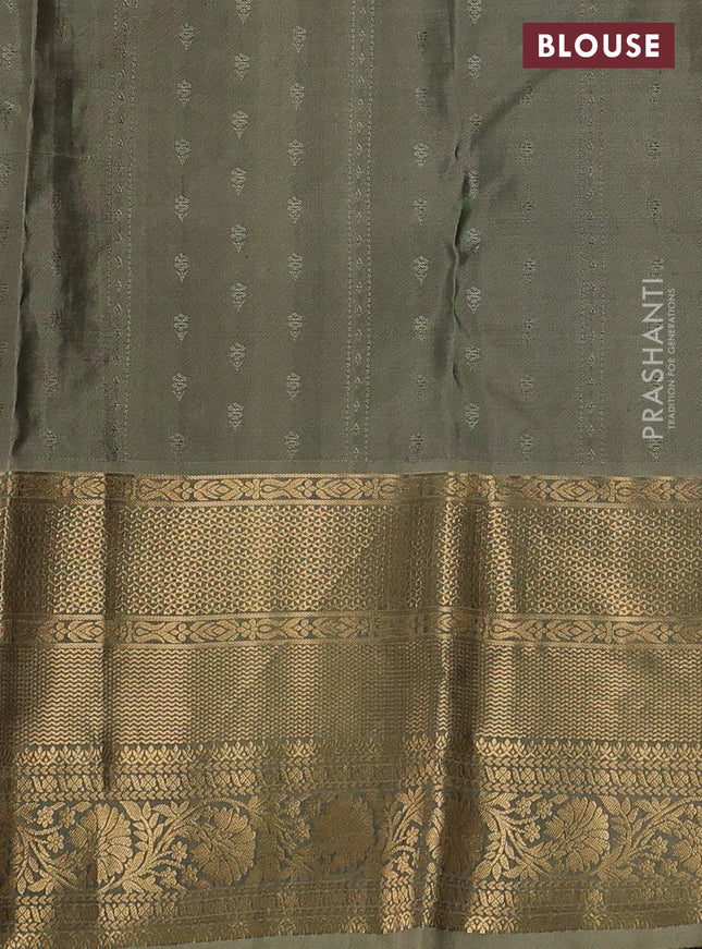 Pure kanchipuram silk saree pastel green and beige with allover zari weaves & buttas and long rich zari woven border
