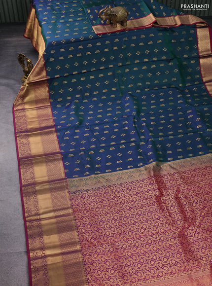 Pure kanchipuram silk saree dual shade of bluish green and dual shade of maroon with allover zari woven buttas and long rich zari woven border