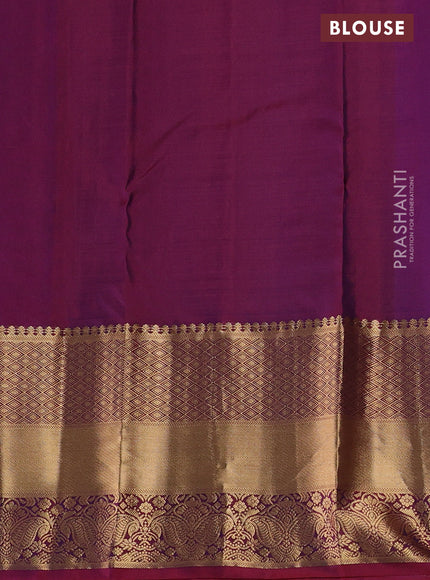 Pure kanchipuram silk saree dual shade of bluish green and dual shade of maroon with allover zari woven buttas and long rich zari woven border