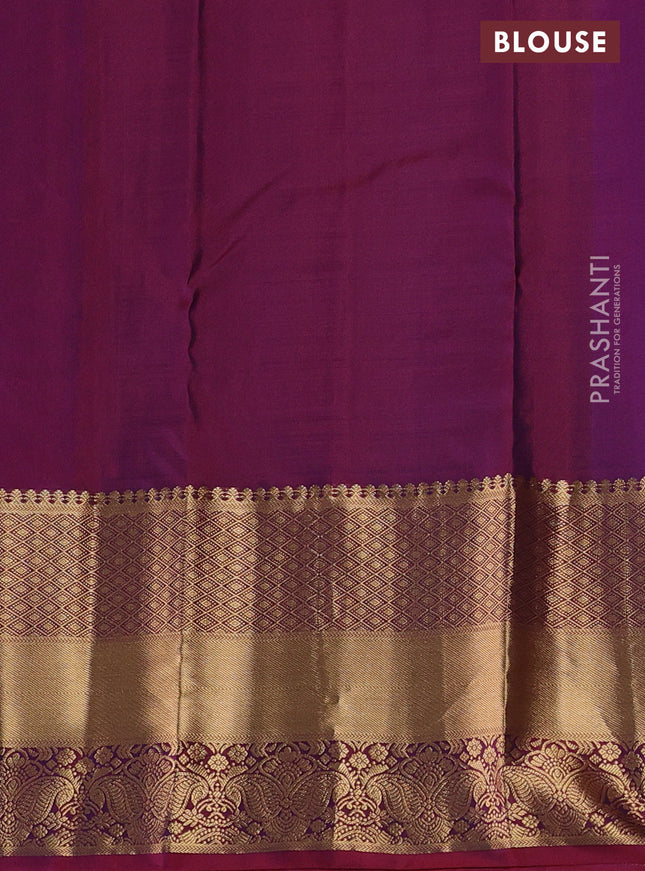 Pure kanchipuram silk saree dual shade of bluish green and dual shade of maroon with allover zari woven buttas and long rich zari woven border