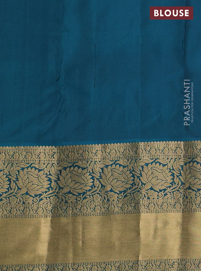 Pure kanchipuram silk saree purple and peacock green with allover zari woven buttas and long rich zari woven border