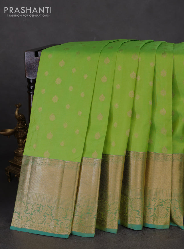 Pure kanchipuram silk saree light green and teal blue with zari woven buttas and long zari woven border