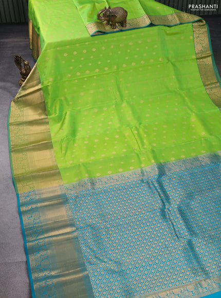 Pure kanchipuram silk saree light green and teal blue with zari woven buttas and long zari woven border