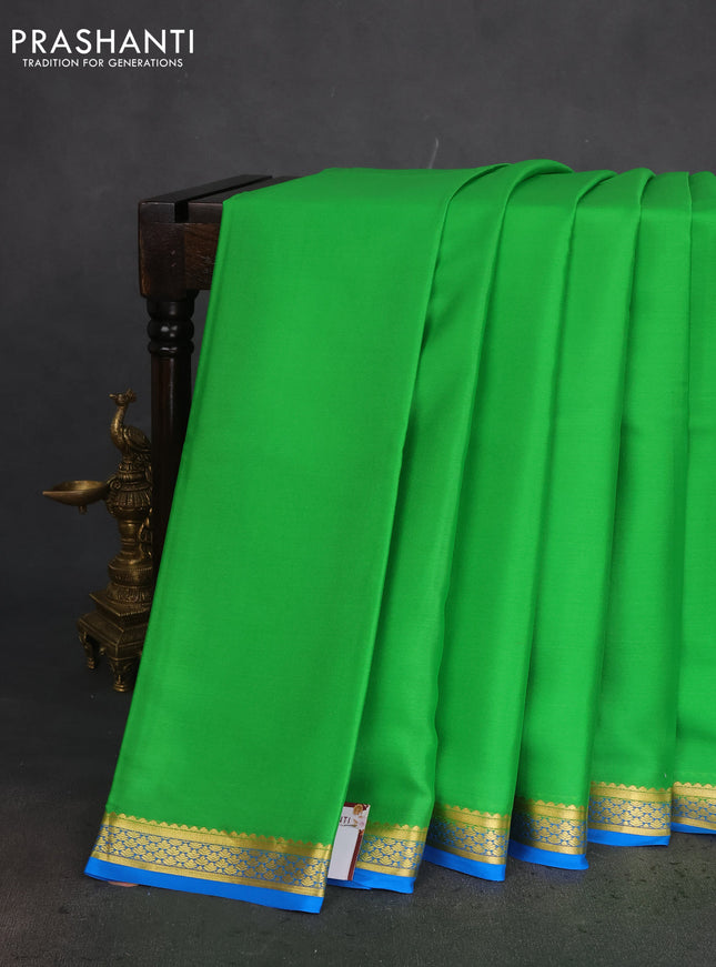 Pure mysore silk saree light green and cs blue with plain body and zari woven border