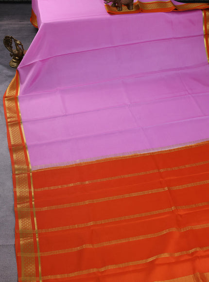 Pure mysore silk saree light pink and orange with plain body and zari woven border