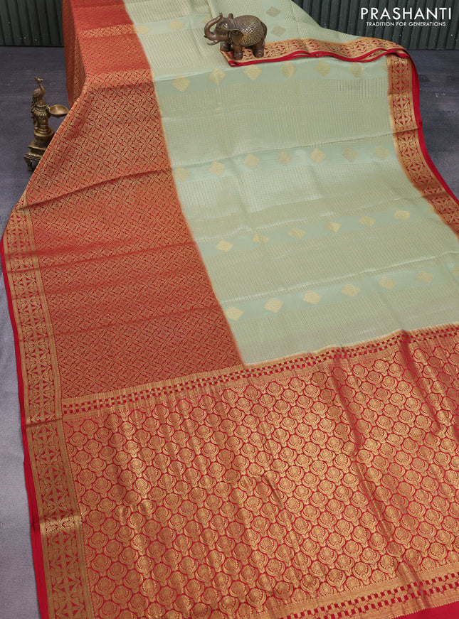 Pure mysore silk saree pista green and red with allover small zari checks and long zari woven border