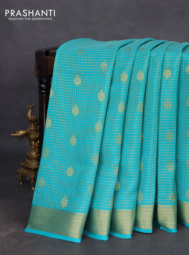 Pure mysore silk saree teal blue with allover small zari checks & buttas and zari woven border