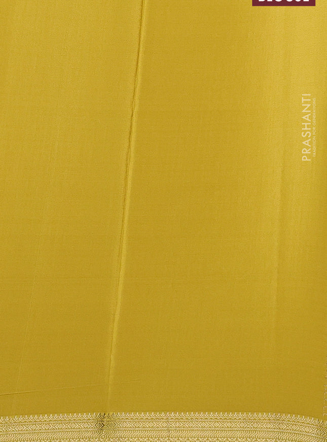 Pure mysore silk saree pale yellow with allover small zari checks & buttas and zari woven border