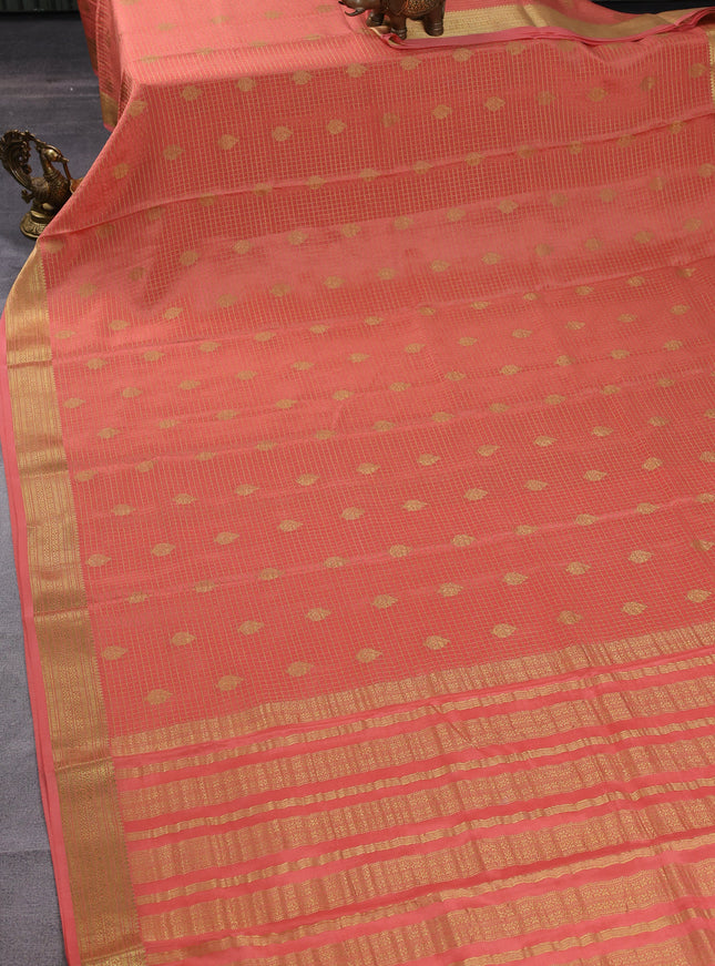 Pure mysore silk saree peach orange with allover small zari checks & buttas and zari woven border