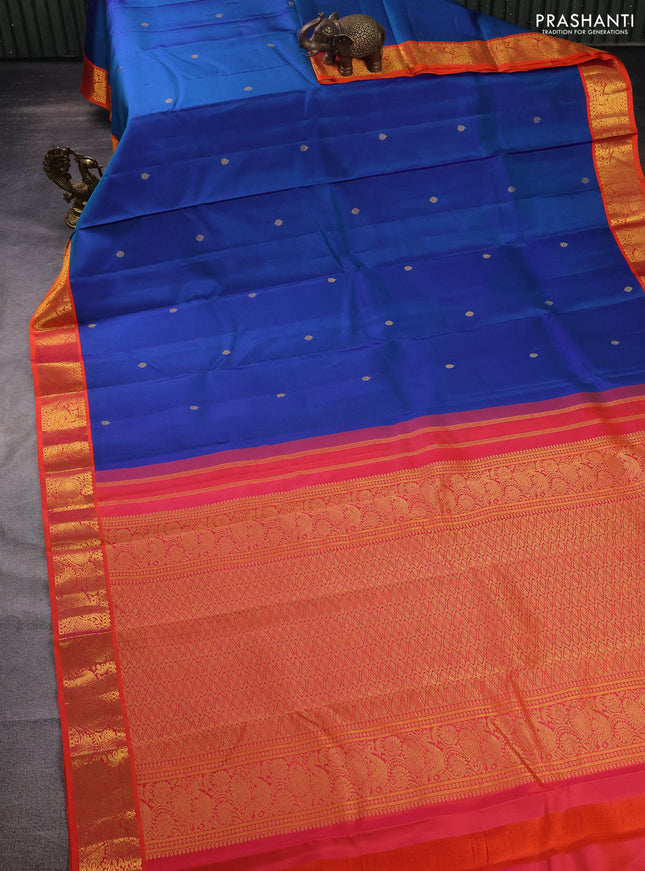 Pure kanchipuram silk saree dual shade of blue and orange with zari woven buttas and zari woven korvai border