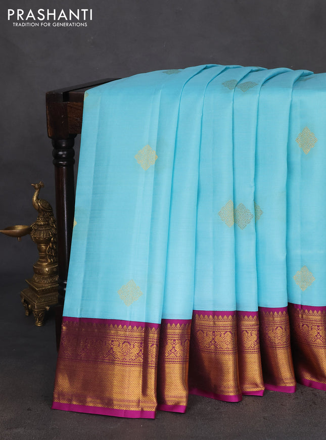 Pure kanchipuram silk saree light blue and purple with zari woven buttas and zari woven korvai border
