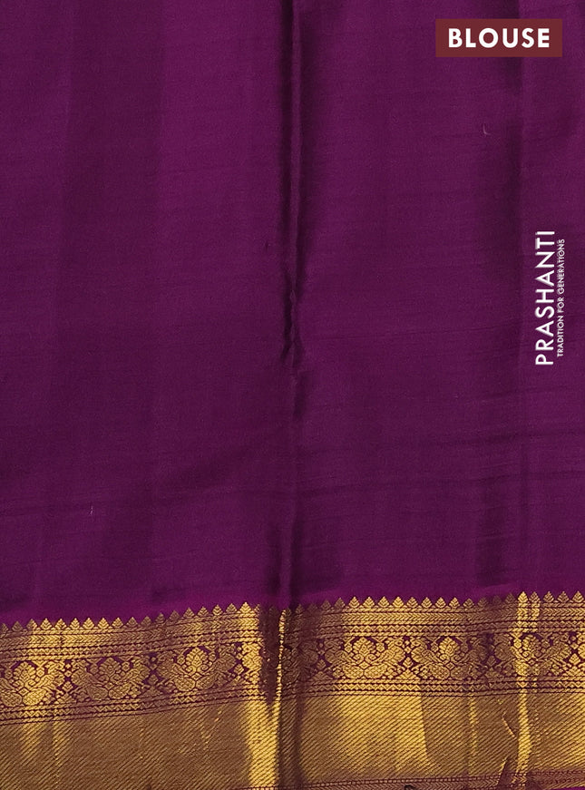Pure kanchipuram silk saree light blue and purple with zari woven buttas and zari woven korvai border