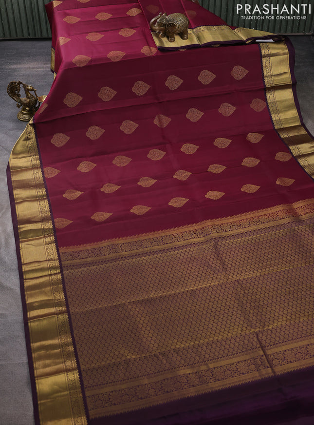 Pure kanchipuram silk saree dark magenta pink and wine shade with zari woven buttas and zari woven border