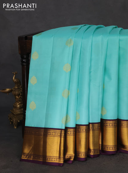 Pure kanchipuram silk saree teal blue and deep violet with zari woven buttas and zari woven korvai border
