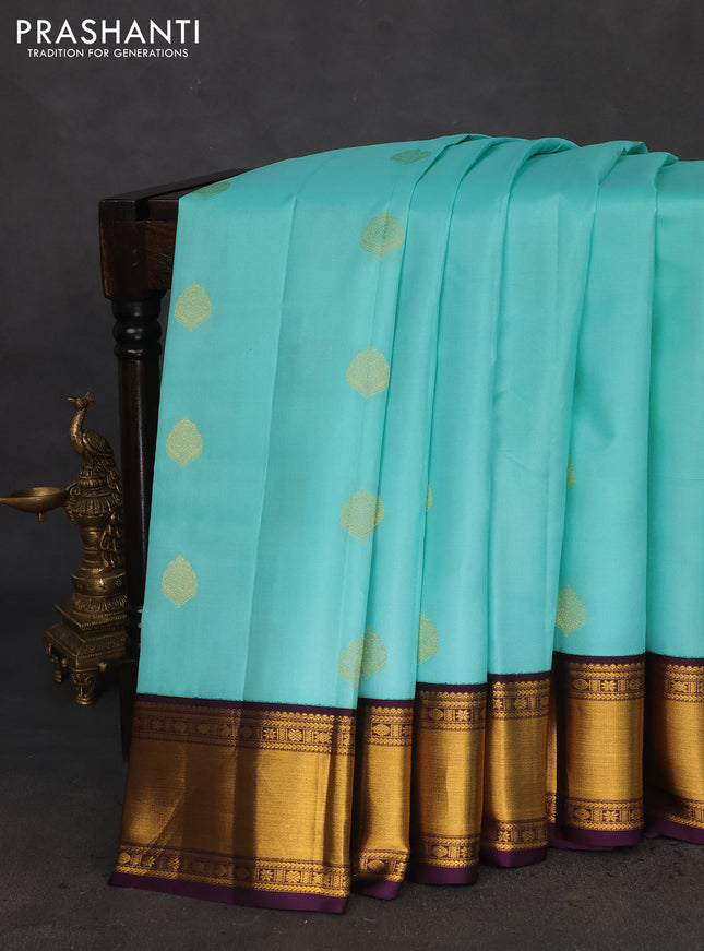 Pure kanchipuram silk saree teal blue and deep violet with zari woven buttas and zari woven korvai border