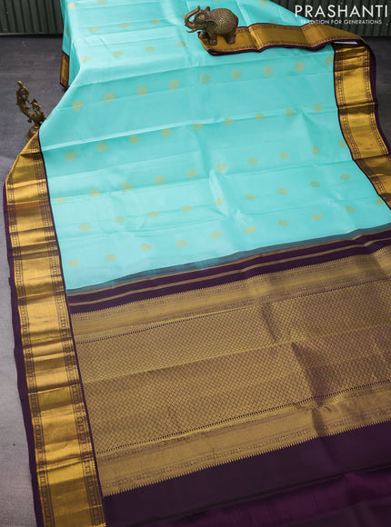 Pure kanchipuram silk saree teal blue and deep violet with zari woven buttas and zari woven korvai border