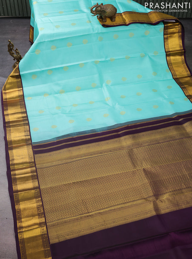 Pure kanchipuram silk saree teal blue and deep violet with zari woven buttas and zari woven korvai border