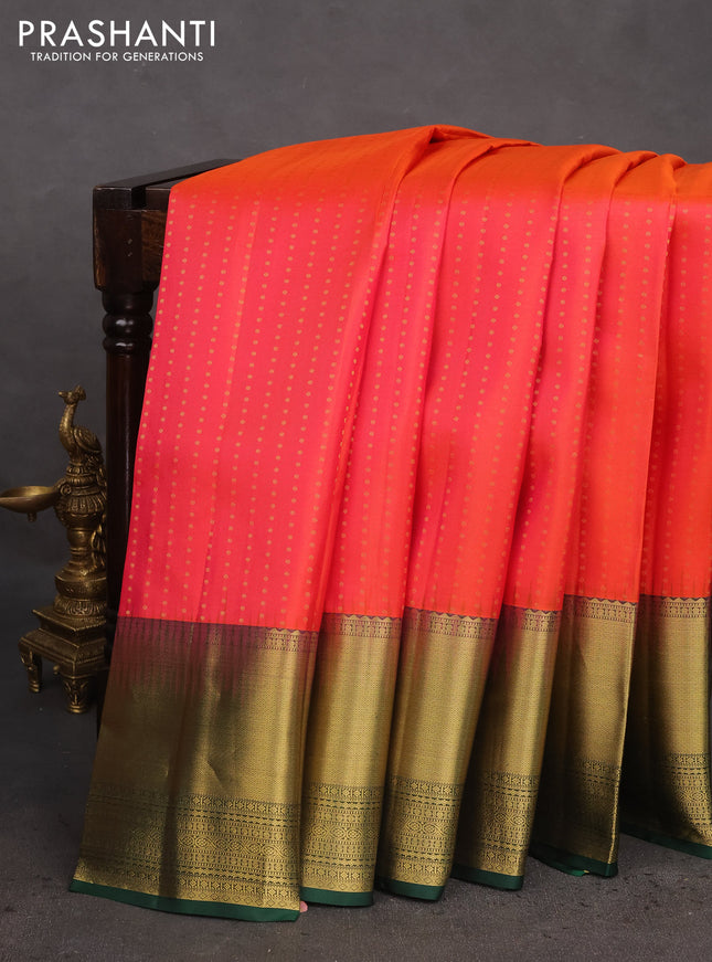 Pure kanchipuram silk saree dual shade of pinkish orange and green with allover zari woven 1000 buttas and zari woven border