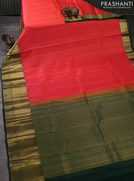 Pure kanchipuram silk saree dual shade of pinkish orange and green with allover zari woven 1000 buttas and zari woven border