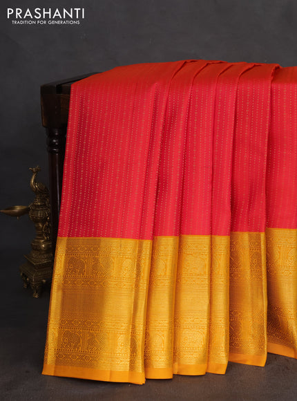 Pure kanchipuram silk saree pink and mustard yellow with allover zari weaves and zari woven korvai border